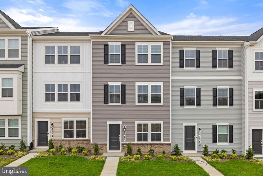 Welcome to this pristine, never-before-lived-in Lancaster townhome—offering an abundance of natural light across three finished levels. With three spacious bedrooms, two full baths, two half baths, and a two-car garage, this residence seamlessly blends style and function.

On the entry level, a versatile recreation space awaits—perfect as a home office, gym, or media lounge—alongside a convenient powder room and rear-entry two-car garage. The main level features a modern open-concept layout that flows effortlessly from the expansive Great Room to the dining area and chef-inspired kitchen, complete with upgraded granite countertops, premium cabinetry, and stainless steel appliances. Step outside to a generous 10x18 deck—ideal for entertaining or enjoying your morning coffee in the fresh air.

Upstairs, the private owner’s suite features a luxurious en-suite bathroom and a walk-in closet, accompanied by two additional bedrooms and a full bath—providing space for everyone to feel at home.

Nestled just minutes from Charles Town and Ranson, Red Clover Meadows offers easy access to local favorites like Martin’s, Weis, Marshalls, Kohl’s, Five Guys, and more. Major conveniences like Home Depot and McDonald’s are also nearby.

Tenant Information: Monthly Rent: $2,100, Security Deposit: $2,100, Pets case by case basis, Pet deposit $500, Minimum credit score: 650, Income requirement: 3x monthly rent. Tenant covers: lawn care, electricity, cable/internet, water/sewer, trash. Landlord covers: HOA dues. Application via RentSpree—link available in the listing. Step into easy living with high style and low maintenance—this stunning townhome is ready to welcome its first resident.