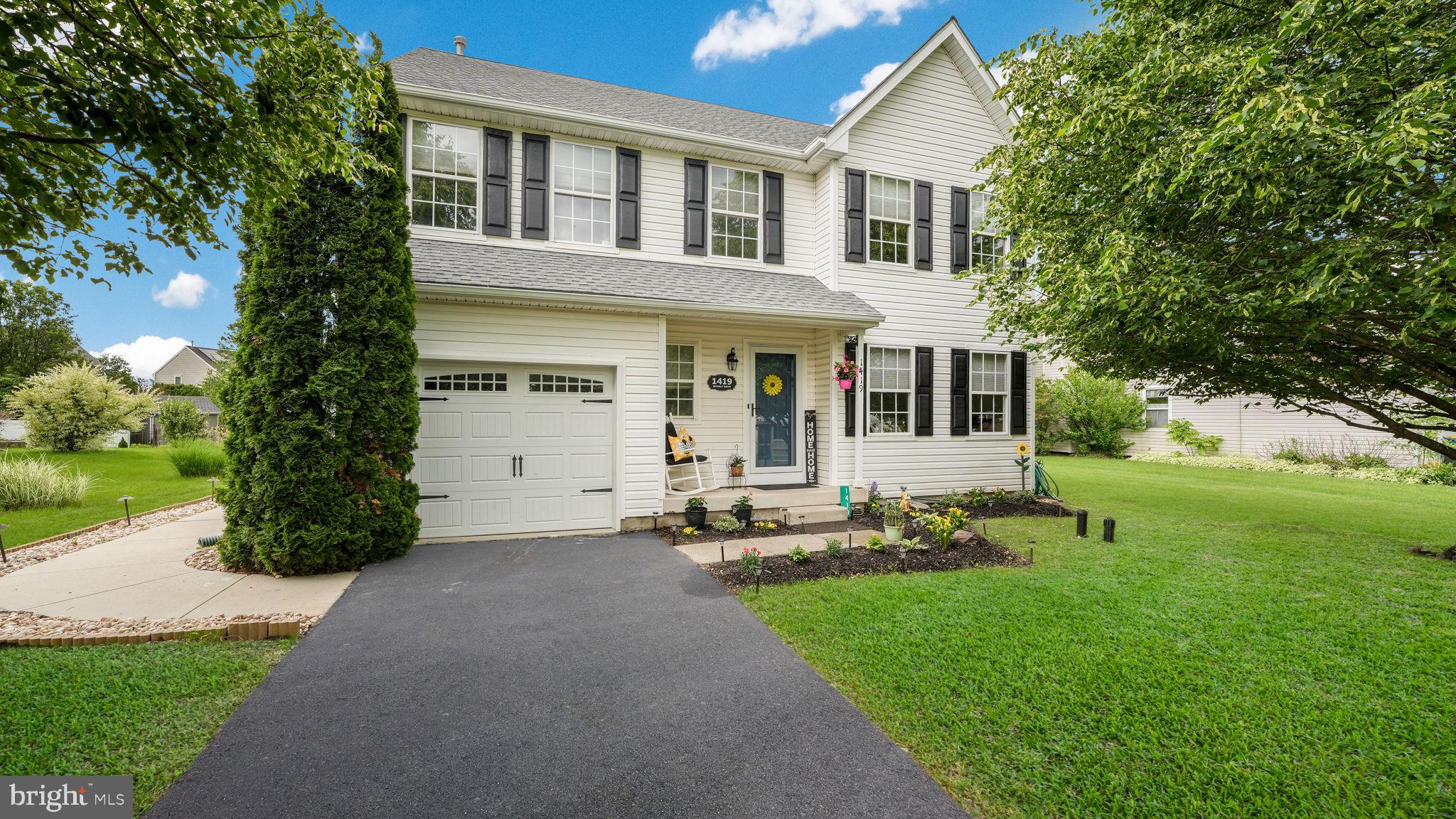 Welcome to 1419 Beverly Drive - A Move-In Ready Gem in Heather Valley! This beautifully updated 4 bedroom, 2.5 bathroom home with a finished lower level and 1-car garage is ready for immediate enjoyment! Step into the inviting 2-story foyer, the perfect place to welcome guests in style. The entire first floor showcases wood plank-style ceramic tile flooring, combining both durability and elegance. To the right, a flexible space awaits - ideal for a home office, formal dining room or playroom. Continue into the heart of the home: a true open-concept layout designed for today’s lifestyle. The chef’s kitchen is a showstopper, featuring a large center island with seating, granite countertops, exposed stainless steel hood vent, granite backsplash, a separate bar area, and a convenient desk nook. This space flows effortlessly into the sun-drenched family room with large windows and a cozy wood stove - perfect for relaxing evenings. A stylish half bathroom completes the main floor. Upstairs, the open railing system adds architectural flair, while a conveniently located laundry room makes daily chores a breeze. The primary bedroom suite offers luxury vinyl plank flooring, a generous walk-in closet, and an updated en-suite bath featuring dual sinks, a large, tiled shower with glass sliding doors, and a window for natural light and ventilation. Three additional spacious bedrooms and a fully updated hall bath complete the second floor. The finished lower level offers endless possibilities - whether you envision a home gym, media room, game space, or additional entertaining area, there’s room for it all, plus ample storage. Step outside to enjoy the fully fenced-in backyard, complete with a deck, patio, hot tub, firepit area, and a shed for extra storage. Whether it’s morning coffee or summer barbecues, this outdoor space has it all. Lovingly maintained inside and out, this home includes a new roof and hot water heater (2020) and a new A/C unit (2022) for peace of mind. Located in the desirable Heather Valley neighborhood with easy access to Routes 309, 313, and 212 - just minutes from Lake Nockamixon and the shops and restaurants of Quakertown. Don’t miss your chance to make 1419 Beverly Drive your next home - schedule your private showing today!