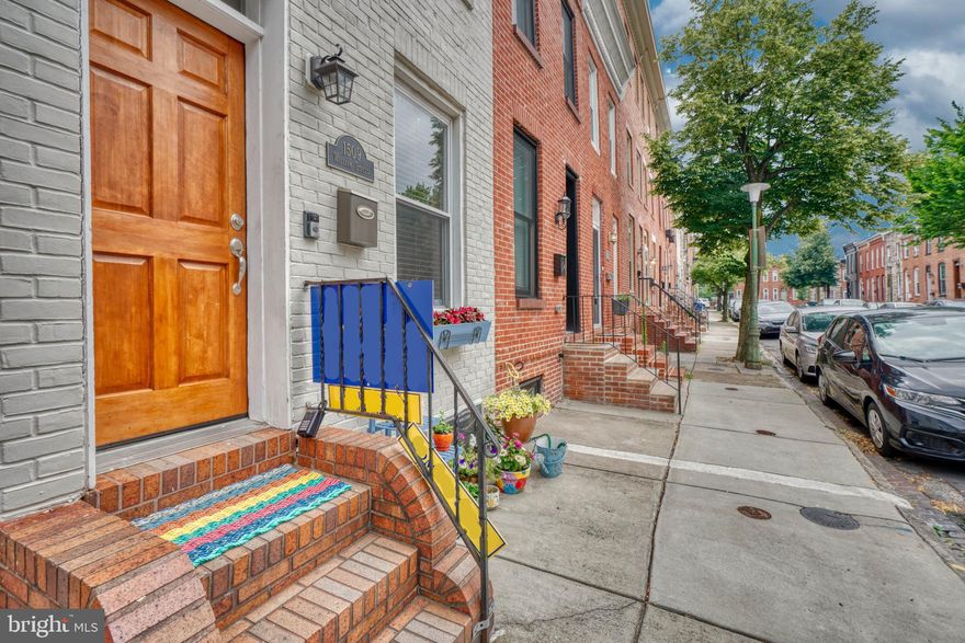 Garage PARKING and great LOCATION!!  This gorgeous 3 level townhome has 3 (above grade) bedrooms, 3.5 updated bathrooms, finished basement and garage parking!  The first floor has a spacious  living room and dining room leading to a kitchen with tile floor, tin ceiling, white cabinets and breakfast bar.  There is a hallway off the kitchen with a large pantry, coat closet, half bath, laundry and access to the oversized one car garage.  2nd floor has 2 bedrooms and 2 full bathrooms (both bedrooms can accommodate a queen size bed).  3rd level has spacious primary bedroom, full bathroom and lots of closet space.  There is an already a door,  just add a rear deck and stairs to access the (existing) rooftop deck! The basement has a finished room perfect for a home office, den, or theater room, as well as additional storage.  You will love the character this home has, including wood ceilings, wainscoting, wood floors, tons of natural light, built ins, exposed brick and more!  This amazing home is on a quiet one way street and is close to Riverside Park.