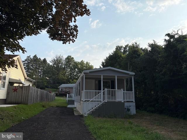 Be the first to live in this brand new 3-bedroom, 2-bath manufactured home on a private lot in Governor Mifflin School District. The spacious master bedroom features a walk-in closet and a private bath. Enjoy an open floor plan with a modern kitchen that includes an island, plus laundry hookups for added convenience. Relax on the front porch and take advantage of off-street parking. No pets. No smoking.