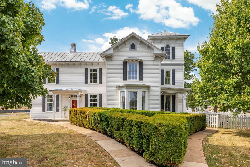 Have you been looking for the perfect sophisticated and elegant historic home?  Do you want everything; a gracious home, amazing space, acreage, a place for chickens, but also walkable and close to town?  It sounds impossible, but you've found it!  Welcome to historic Maplewood, circa 1872, know colloquially as The Tower.  With no HOA and business B-1 zoning, this property presents endless possibilities, allowing dozens of potential uses!  With stunning Italianate architecture and over an acre of land, this property is one in a million.   This landmark home located in the heart of lovely downtown Middletown is a piece of history with all the modern conveniences.  Rich with history, this amazing property was once the home and studio of John Chumley, a famous local artist.  (The current owners have tons of photos and information about the history of the home that they'd love to share with you!)  Too many amazing features to list; gorgeous high ceilings, original hardwood floors, wrap around built ins, huge windows, original millwork throughout, a generous kitchen and huge walk in pantry, fabulous mudroom, several outbuildings for storage and work space, an amazing chicken coop; the list goes on and on!  Featuring four large bedrooms and two and half bathrooms, this home is spacious, beautiful, and elegant.  The panoramic mountain views will take your breath away, especially from the tower studio room.  And the home sits on a fantastic level lot behind public memorial land!  All of this, located right in the center of town, so shopping and restaurants are just steps away.  Middletown is an ideal location for commuters, with Rt 37, I-66 and I-81 within just a few minutes drive, not to mention all the natural beauty, activities, and amenities of the Shenandoah Valley.  This is the one!!!