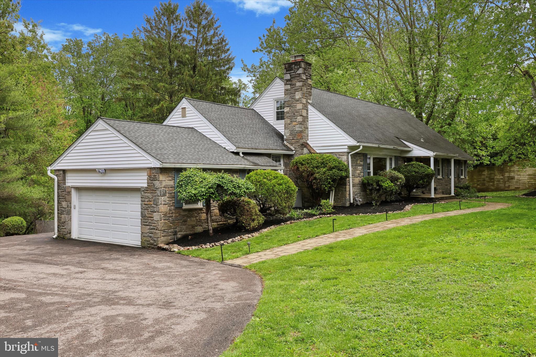 Come and experience this expansive cape code with an open floor plan and great architectural detail. The heart of the home is a fabulous great room with floor to ceiling windows, allowing for an abundance of light and wonderful panorama views. Wood ceiling beams with exotic Brazilian teakwood flooring give the house a cozy, modern cabin style vibe, perfect for all of Gladwyne’s seasons. Step outside to an oversized deck, perfect for entertaining or enjoying serene views of the large private backyard. The large eat-in kitchen with granite countertops and backsplash flows into a dining area from one side and has access to the garage, which adds practicality and convenience.
This home includes 4-bedrooms, 3-baths and an additional powder room that blends functionality and comfort in a beautifully designed open layout. The first-floor owner’s suite offers privacy and convenience, while MULTIPLE OFFICES provide ideal flexible space for working from home. The second floor has 2 bedrooms, multiple closets, and a Jack and Jill bathroom, as well as additional space that can be used as a second floor office or exercise room. The large, finished walk-out basement adds versatility and can be used as a guest room for extended stays, gym or recreation space.
This home is much larger (over 4500 sqft) than what it looks from the outside and it seamlessly combines practical features with inviting spaces and it has tons of storage, making it ideal for both everyday living and memorable gatherings. It is freshly painted and is in move-in ready condition. The shed is in the backyard.
The home is located in the award winning Lower Merion school district. Gladwyne’s village includes a super market, library, pharmacy, cafe, and more. Riverbend Environmental Center and Bridlewild Trails are also nearby. There is easy access to the Expressway, Blue Route, and PA Turnpike, making this location an easy commute to Center City, King of Prussia, or Philadelphia International Airport.