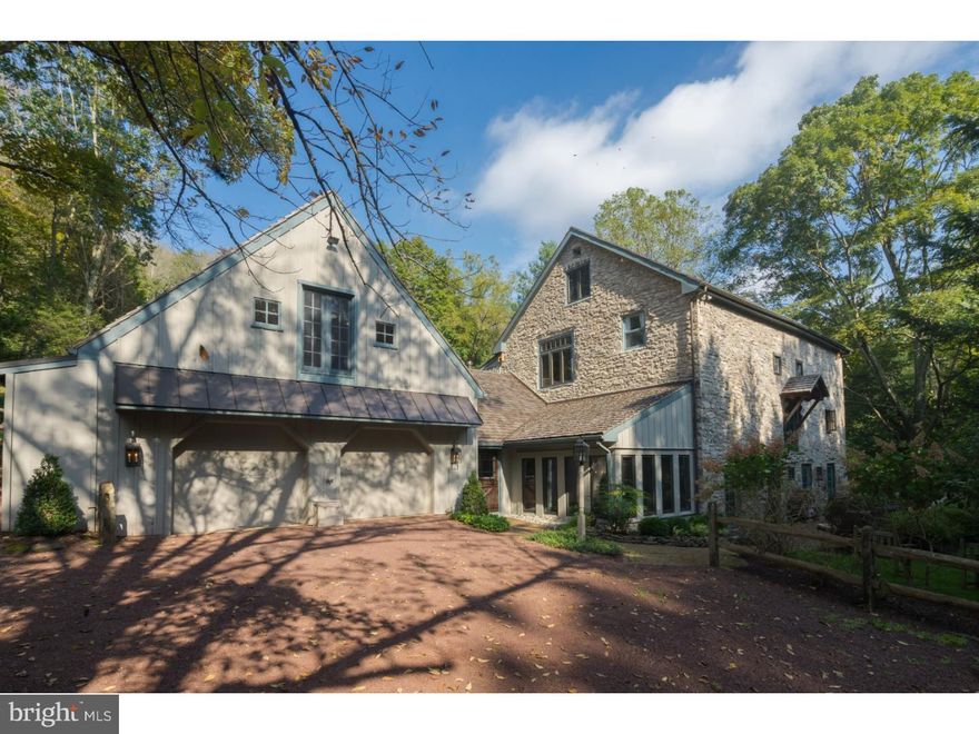 Situated on Solebury's bucolic Fleecydale Road, with its scenic bluffs, historic homes and Paunacussing Creek, this spectacular converted barn affords a perfect combination of 18th century charm and 21st century luxury, in a quintessential Bucks County setting. This fabulous home has been lovingly restored and enhanced, with a new cedar shake roof, a stunning interior renovation, and a re-pointing of the antique stone walls. Its numerous, warm and intimate interior spaces are replete with period details, including hand-hewn posts and beams, brick and plank flooring, Mercer tiles and multiple fireplaces. Spaces are seamlessly interconnected via a modern, open floor plan that is perfect for entertaining, and enjoying an elegant, country lifestyle. Stand in the Great Room, dramatically overlooked by the Living Room, one story above, and lose yourself in the drama of soaring ceilings and elegant accents. Move into the stunning chef's kitchen to be pampered by its La Canche range, Sub-Zero refrigerator, custom bar/wine storage, concrete countertops and radiantly-heated concrete floors.  Step out onto the front patio, to savor the sights and scents of the home's truly magical location. The magnificent formal Dining Room, adjoining the Living Room, looks out through French doors onto 10 acres of wooded hillside, and opens to an inviting outdoor terrace, with stone walls, a hot tub and built-in stone fireplace, that provides a perfect retreat for private relaxation or entertaining. Additional features include: a stunning Master Bedroom suite, with vaulted ceilings and exposed stone walls; a Guest Suite over the 2-car garage; 4.5 fully redone bathrooms; 4 bedrooms, and numerous, charming, flex spaces. In the award winning New Hope-Solebury School district, with easy commute to NJ, NYC and Philadelphia. Come visit...you'll want to stay!