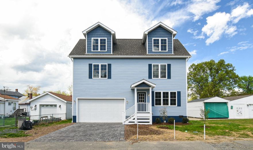 New Home on The Point in Colonial Beach!  Beautiful 3 story, 3 bedroom, 2.5 bath, plus attached garage with AC & heat.  Located just a couple blocks from Monroe Bay sunsets and Potomac River sunrises with a peek of water view.   Imagine how comfortable family life would be in this 1,769 sq ft home.   Seller financing is offered with 20% down, acceptable credit score, 6% interest for 15 years plus $3,000 towards buyer closing costs.  The Point location is a short walk or golf cart ride to the Town's swimming beaches, boat ramp, marinas, restaurants, shopping, and fun year-round events. Enjoy exploring the Northern Neck's famous historic sites, miles of shoreline, and a variety of shops, restaurants, wineries, breweries, and parks. Only 20 minutes to Dahlgren, and 90 min to DC or Richmond. Voluntary HOA.