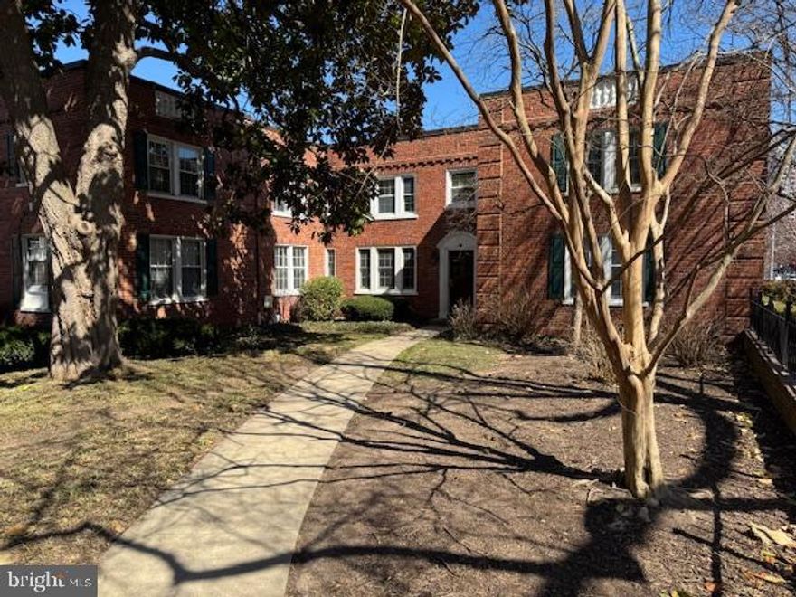 Fabulous light-filled corner unit that has been beautifully renovated!  Wood floors throughout.  The spacious living area features built-in bookcases and crown molding.   An updated kitchen with granite counters and newer appliances, including dishwasher.  French doors lead to the nice sized bedroom with track lighting and crown molding.  An ensuite bath, also renovated, includes ceramic tiled floors and a ceramic tiled shower with a frameless shower door.  There are 2 walk in closets - one in the bedroom and one off the living room.  Additional storage, which is perfect for bikes and more, is included.  Laundry facilities are on site.  This is a GREAT location!! Convenient to restaurants, shops, bus and 2 Metro stops!