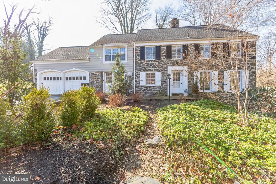 Welcome home to 15 Brookside Road, set on one of the most picturesque and well-situated streets in Wallingford. A beautiful Stone Colonial, the home is tucked away with nearly 3 acres of land on a quiet cul-de-sac, yet wonderfully close to schools, the SEPTA train station and Media Borough. This 5 bedroom 4.5 bath home has had numerous tasteful upgrades and improvements all while retaining the character and beauty of the home.

Enter into a gracious front hallway with random width hardwood floors and a curving staircase. The entry hall leads to the large open dining room with gas lanterns and a window seat. The newer kitchen is the heart of this open floor plan with soapstone counters, slate floors, upgraded stainless appliances and numerous custom details. There is a wood burning stove and a sitting area overlooking the pretty patio and lovely lawn. Adjacent to the kitchen is a mudroom with built-ins, a newer powder room and access to the 2-car attached garage. Completing the first floor is a large living room with stone fireplace, built-in bookshelves and French doors overlooking the grounds and patio below. 

Downstairs is a large family room with a wall of doors that open to the patio, brick floors and a decorative fireplace. There is also a full bathroom, laundry and utility room with ample storage.  

Upstairs on the second floor is a wonderful primary suite with a walk-in closet and recently updated private bath. The adjoining room serves well as an office or extra bedroom. Down the hall there are three additional bedrooms and two more hall baths. On the third floor is a huge bedroom/bonus room, a cedar closet and more storage. (The third floor bedroom is heated/cooled - prior text was incorrect.)

Outside there is so much to enjoy - multiple patios, one with a gas grill hook-up, a gardeners shed, a small stream, a lush lawn, and naturalized low-maintenance woodlands. This home includes a second lot, creating many possibilities for the new owner. 

While the setting feels remote, Media Borough is nearby lively with holiday parades, Dining Under the Stars in the warm months, unique restaurants and stores, as well as essential necessities.  Located in the Wallingford Swarthmore School District, the elementary school age residents can follow a footpath to Wallingford Elementary School through the neighborhood. The neighborhood is convenient to local swim clubs and two train stations, as well as I-95 and I-476, making Philadelphia, the airport and other regional destinations easily accessible. (Please excuse the improvement project currently being implemented by AQUA in the neighborhood.)