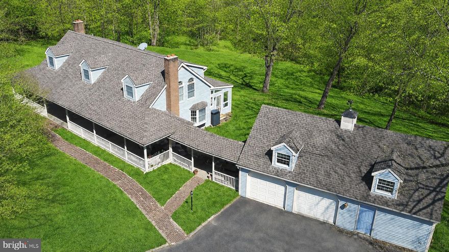 COMING SOON TO BALDWIN (Harford County). Escape to a private sanctuary offering the rare combination of a 2,700+ sq. ft. finished interior and 17 acres of pristine, tree-lined of wooded bliss. This charming Colonial greets you with a sweeping wraparound porch, perfect for quiet mornings overlooking your expansive grounds. The main level features a cozy family room with a fireplace, formal living and dining rooms, kitchen with pantry, half bathroom and a sun-drenched sunroom that leads to a rear deck—your front-row seat to local wildlife. 

Upstairs, the primary suite offers a true retreat with a soaking tub and separate shower, double sink vanity and double closets. Upper level hall is accompanied by three generous bedrooms, full bathroom and a convenient upper-level laundry. With an unfinished basement ready for your vision, this is more than a home; it’s a legacy property.

For the craftsman or collector, the property features a detached 2-car garage with an attached workshop and massive upper-level storage, complemented by a separate barn. 

This Baldwin gem is the ultimate private sanctuary ready for you to call home!