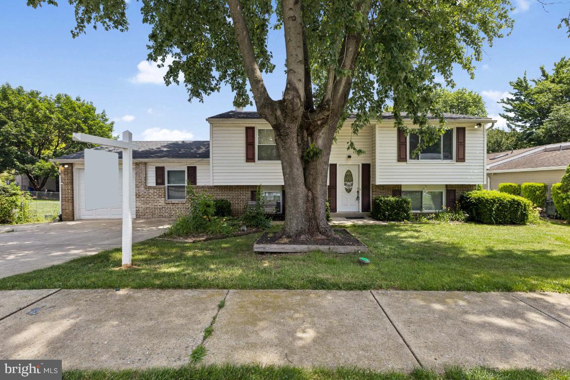 Discover this spacious split foyer home nestled in the Glade Towne Community of the peaceful town of Walkersville. Perfectly designed for comfort and functionality, this home features 2 Bedrooms 1 Bath on Upper Level and 2 Bedrooms 1 Bath on Lower Level. The Upper Level Boasts an Open Kitchen/Dining and Living Room Area with a Large Deck off of both the kitchen and dining room. The lower level has a Nice Sized Family Room with a cozy wood-burning fireplace, ideal for relaxing gatherings. The Laundry Area on lower level offers convenient access to the garage, which includes a substantial workshop area - great for hobbies or projects. The garage also has a door leading directly to the backyard, providing both practically and versatility. Located just minutes from Frederick, this quiet neighborhood offers the tranquility of small-town living while still being close to all the amenities and activities the city has to offer. Don't miss your opportunity to make this one your own!