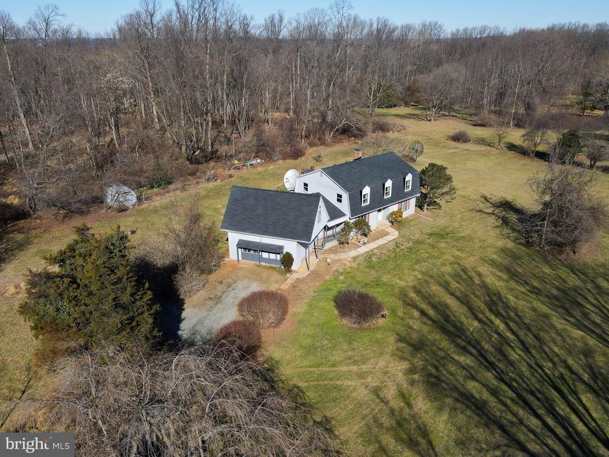 Over 7 acres of peaceful seclusion....This home is loaded with space inside and out, waiting for a special Buyer to make it their own.  4 bedrooms, 2.5 baths, 2nd floor laundry, spacious main floor living areas and beautiful grounds to enjoy! 


* As is Estate Sale *
**Easement allowing 3 other properties to use the driveway from Ridge Road proper to the entry of the home's immediate driveway area **