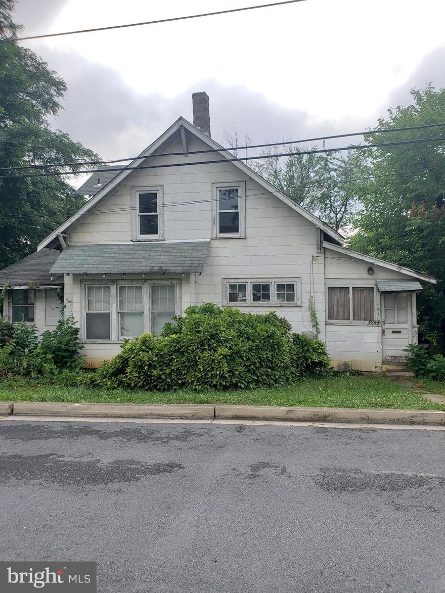 **INVESTOR ALERT** This family home located 5 min (walking) from the new Purple Line metro features 3 bedrooms, 2 full baths and 2 extra porch rooms for additional living space. Basement with laundry area and walk-out. Hardwood floors throughout that just need to be re-finished. Huge lot!! House needs full repair but has big potential! The owners have cut down several branches on and around the roof, have had the roof inspected and repaired as needed and fixed chimney. Also all second floor and back window on first floor are less than 2 years old. Structurally sound home, just needs internal updates to be great again! Close to major roads, public transportation and shopping center.