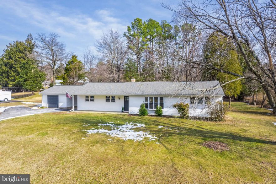 Welcome to your dream home in Reisterstown, Maryland! This inviting 4-bedroom, 3-bathroom residence features an open floor plan with abundant recessed lighting throughout. The modern kitchen is a culinary delight, boasting sleek stainless steel appliances and a spacious central island with breakfast bar that’s perfect for meal prep and casual dining. You’ll love gathering with loved ones in the expansive family room, where comfort meets style, and enjoying meals in the dedicated dining area designed for both formal and everyday occasions. All three full bathrooms have been tastefully updated. The fourth bedroom offers flexibility and can easily be transformed into a home office. A highlight of this home is the three-season room at the rear, offering a perfect spot for relaxing and enjoying the changing seasons. Outside, enjoy a large backyard with a fire pit, ideal for entertaining. An attached garage with a breezeway adds convenience. Located near amenities, this home perfectly balances comfort and community charm.