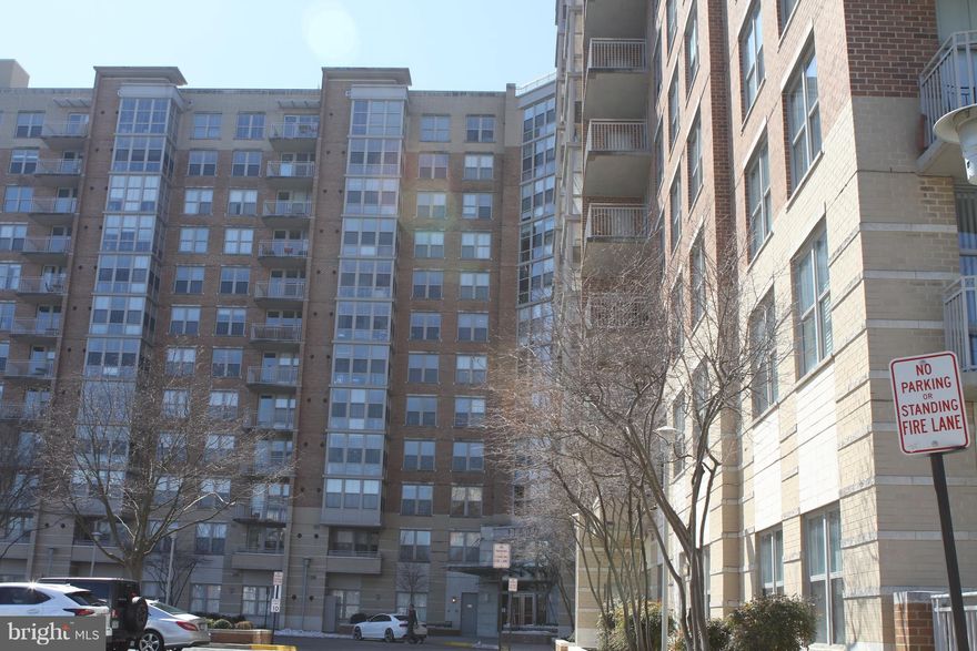 6-12 month lease ok!(6-9 month lease will be $2100)  Excellent location!  Walk to Metro station and Reston town center!  This beautiful one bedroom plus sunroom unit with hardwood floor facing city view and loaded with the following: New hot water heater/HVAC (2022), New Stove (2022).  Garage parking (#120 on B3) and Water/Sewer are included in the rent.  Experience the best of comfort and lifestyle with luxury amenities including a rooftop pool, state-of-the-art gym, business center, cafe, movie room, party space, garage parking, and 24-hour security.  You will not want to miss this one!  
The owner will need two weeks to move out.  Please Park in visitor parking spaces and get a temporary pass from the front desk. Please remove shoes in the foyer or wear shoe covers.  Thank you!