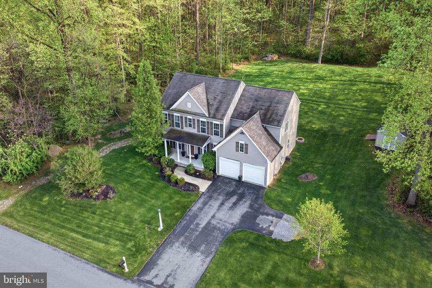 Modern Luxury Meets Wooded Seclusion in Elizabethtown!
Experience the perfect blend of sophisticated design and serene privacy in this meticulously maintained 4-bedroom, 2.5-bathroom home. Situated on a sprawling 2.21-acre lot, this home offers a rare level of tranquility, backing up to the Conowango gun club lands to ensure your view remains lush, wooded, and private for years to come.
Main Level Excellence: As you step through the grand 8-foot front door, you’re greeted by soaring 9-foot ceilings and a sun-drenched, open-concept layout. The gourmet kitchen is a chef’s masterpiece, featuring granite countertops, an expansive island, a gas cooktop, and high-end double wall ovens. Whether you're working from the quiet home office or hosting in the formal dining room, the oversized windows frame picturesque views of your private acreage.
Comfort & Potential: The second floor features a spacious primary suite and three additional large bedrooms with like-new carpeting. Looking for even more space? The massive unfinished basement is a blank canvas, already roughed-in for a full bath and featuring an egress window, making it perfect for a future fifth bedroom, gym, or media room.
Outdoor Living: Step out onto the large rear deck—your front-row seat to nature. In the spring and summer, the mature timber provides total screening from neighbors, creating a true backyard oasis.