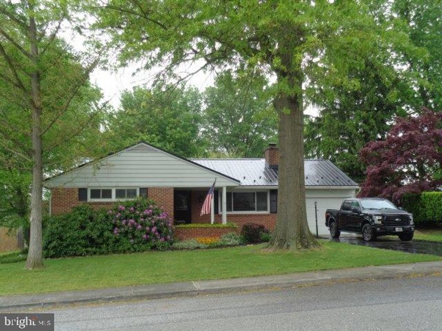 Solid, well maintained brick ranch in the Shippensburg Borough. Wood floors throughout most of home, brick fireplace in living room, 1st floor laundry chute, 2-year old metal roof, rear wood deck and masonry patio, privacy fence in rear yard, oil hot-water heat with electric heat pump backup, vinyl clad windows and much more.   "PRIOR TO SHOWING THIS LISTING, THE PROPERTY ACCESS NOTICE FORM MUST BE EXECUTED AND RETURNED TO THE LISTING AGENT".