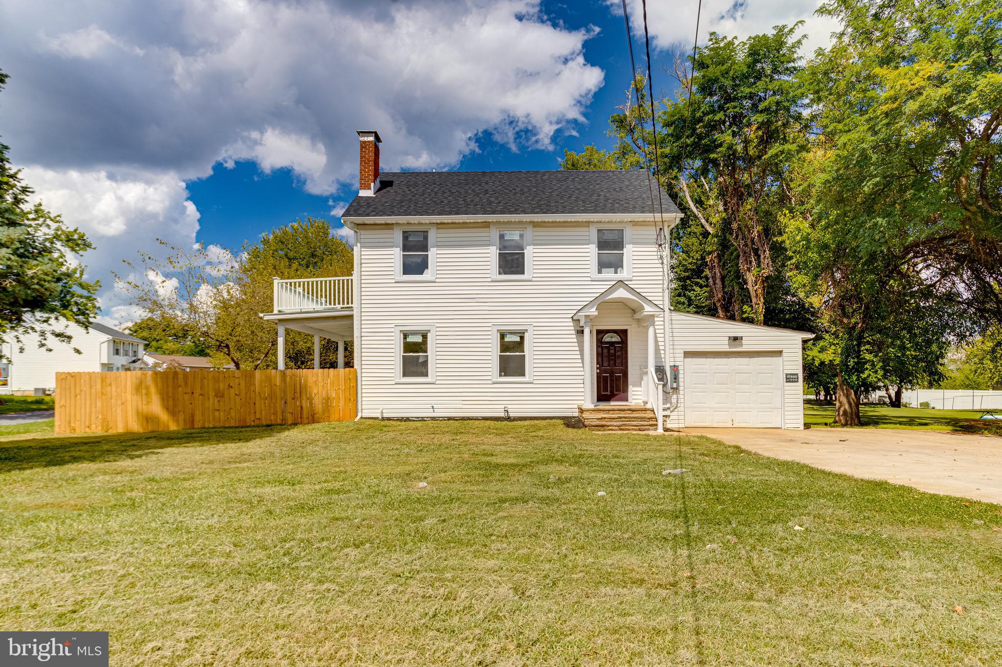 Beautifully renovated 4BR/3BA home in Pikesville! The main level features an open floor plan and a beautiful kitchen with stainless steel appliances and granite countertops. Updates include a brand-new roof, windows, and all new flooring throughout. Enjoy two separate decks and a spacious, level backyard, partially fenced—perfect for outdoor activities and entertaining. The fully finished basement adds extra living space for family, guests, or recreation. A very large driveway provides plenty of parking for family and guests. Excellent location—just minutes to 695, 1 mile to the Metro, and close to shopping and retail. Move-in ready with modern upgrades inside and out. Don’t miss the chance to call this stunning home your own!