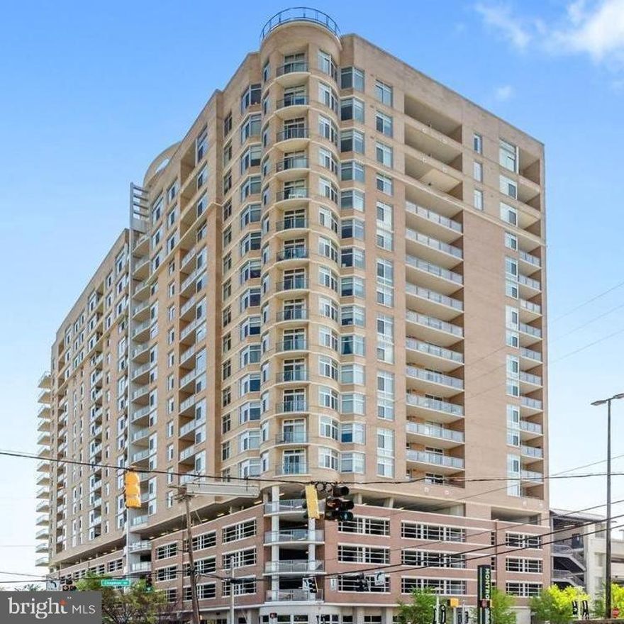 Welcome home  to this spacious 2BR/2BA + Den Condo with Balcony in Midtown Bethesda North, with  over 1,600 square feet of bright, open living space  with a versatile den /office located in the highly sought-after Midtown Bethesda North. Designed for both comfort and entertaining, this residence features hardwood floors throughout the living and hallway areas, brand-new carpeting in the bedrooms, and a large private balcony that fills the home with natural light.  The thoughtfully designed floor plan offers generous room sizes, ideal for relaxing or working from home, or hosting guests. A full-size in-unit washer and dryer add everyday convenience. Rarely available, this unit comes with TWO reserved garage parking spaces, water, and gas. You only pay for electricity.
Midtown Bethesda North delivers resort-style amenities, including a rooftop pool with panoramic views, state-of-the-art fitness center, theater room,  stylish party lounge, and a guest suite available for $150 per night, a big plus!  Enjoy peace of mind with 24-hour concierge service , and take comfort in a building known for its exceptional staff, cleanliness, and meticulous maintenance.
The location is unbeatable. Just steps from the Red Line Metro (North Bethesda and Twinbrook stations) and minutes to Montrose Crossing  home to  Giant, Target, Marshalls, Starbucks, banks, dining options, and more.  Experience the best of urban living with the ease and comfort of a well-connected neighborhood, without the congestion of downtown. Comfort, convenience, and style come together in this exceptional home.