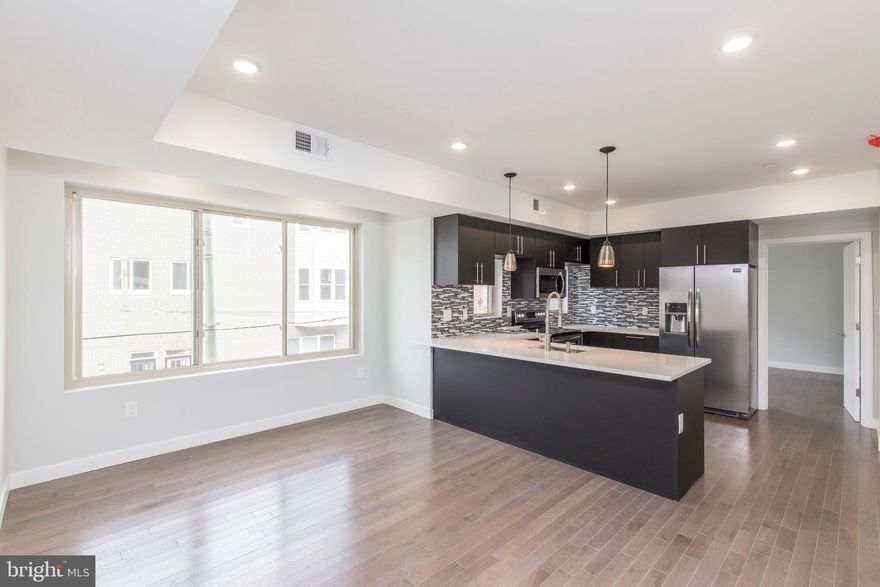 Prime Point Breeze corner Triplex available! Situated at 22nd and Morris, this gorgeous 3 Unit Building was constructed in 2018 and is fully occupied. Already generating income and with 8 years left on the tax abatement, you can settle, sit back and collect.Features include 10 foot ceilings, natural lighting from the large windows and living space, fine hardwood flooring, modern kitchens featuring stainless steel appliances, quartz counter tops, slow closing cabinets, flawless backsplashes and islands with bar top seating for entertaining. All bedrooms feature hardwood flooring, large closets and recessed lighting. The full bathrooms provide you with fantastic tile throughout, shower and vanity. The first and third floor units offer private outdoor spaces, a back yard on the first floor, and a private roof deck with amazing views on the third. In addition to all of this you will enjoy the benefits of 8 years left of the tax abatement! At this prime location the tenants will enjoy easy access to restaurants, shopping, schools, public transportation and much more. Close to I-76 and I-95 for an easy commute out of the city.