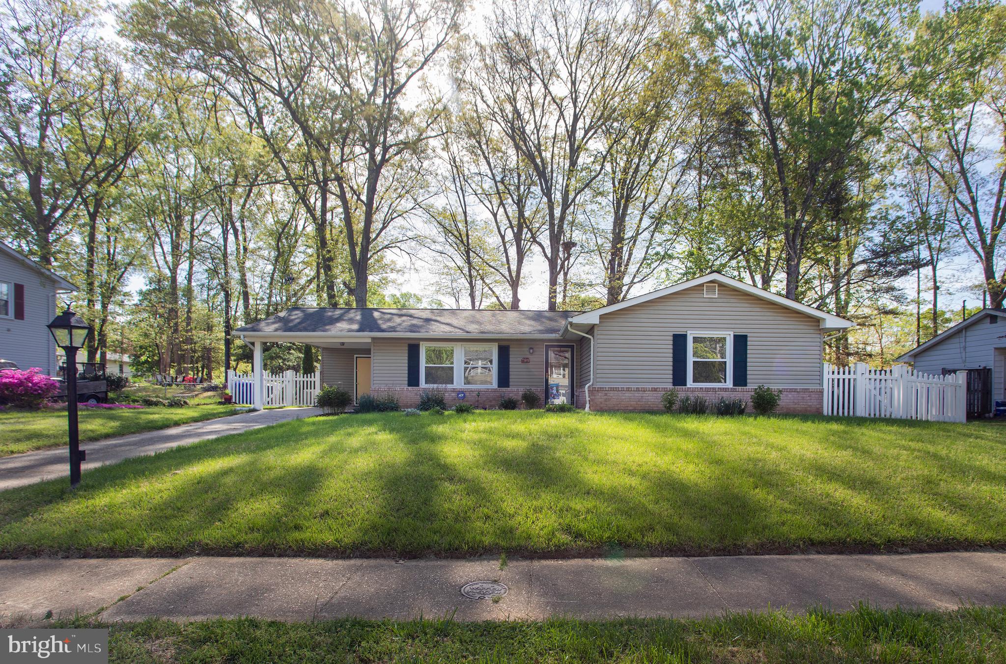 Welcome to this charming single-family rambler located in the heart of Waldorf! Recent updates include UPDATED Kitchen & Bathrooms, NEWER Appliances & flooring, HVAC(2016) and Roof (2012), Garden Shed and Vinyl Fence (2013). This well-maintained home features 3 spacious bedrooms and 1.5 bathrooms, offering a comfortable and functional layout.
Step into the large, separate living room filled with natural light, perfect for relaxing or entertaining guests. The updated kitchen is a standout, boasting custom cabinetry, granite and red laminate countertops, modern appliances, and a sleek glass range hood. Just off the kitchen, you'll find a dedicated dining area that connects seamlessly to the fenced backyard and includes direct access to the covered carport—making everyday living and entertaining easy and convenient. Each bedroom offers generous space, large windows, and scenic views of the beautifully landscaped front and back yards. The outdoor space is a true retreat, thoughtfully curated with perennial shrubs that bloom throughout the seasons. An attached covered carport provides convenient, sheltered parking. Centrally located, this home offers quick access to shopping, dining, and all major highways. And the best part? No HOA! Don’t miss the opportunity to own this delightful home in a prime location.