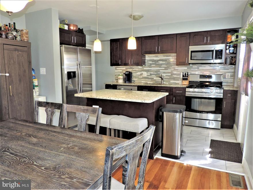 BACK ON THE MARKET! BUYER'S FINANCING FELL THROUGH. GOLF COURSE VIEW End Townhouse, Newly Renovated in 2017, 3 bedrooms, 2 full baths. Gorgeous OPEN Kitchen w/ Island & Granite Countertops, Striking Backsplash, Steel Appliances & Ceramic Tile Floor.  Refinished Wood Floors in Living Room, & Bedrooms. Fully Finished Lower Level. In 2020: New  HVAC, New Water Heater, New Sump Pump. Replacement Double Pane Windows. New service cable & electrical panel in 2017. New Drop Down Stairs to Attic for more Storage. Washer & Dryer may or may not stay.  2 Car Parking Pad in Rear. The front of the house overlooks the Mount Pleasant Golf Course! Very close to Towson. SELLERS ARE GIVING A CARPET ALLOWANCE FOR THE BASEMENT CARPET.