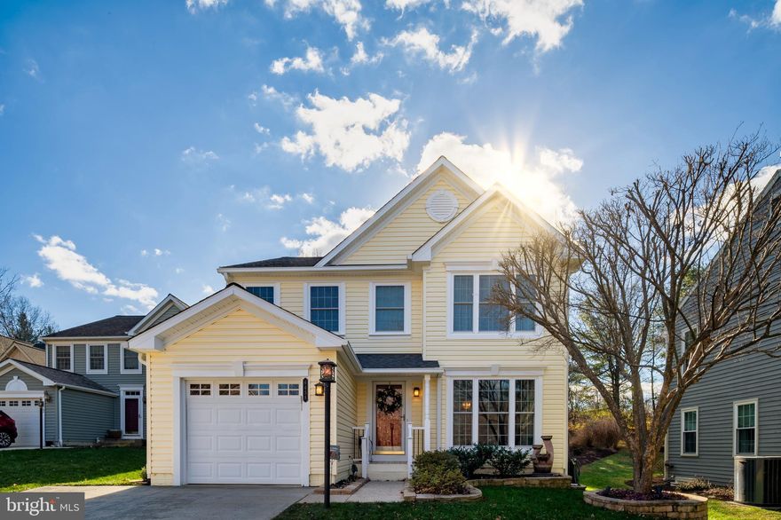 From the moment you pull into the driveway, this home makes it clear that it’s something special—the kind of place that instantly feels like home. The thoughtfully designed floor plan flows effortlessly from the foyer into the living and dining room, then continues into the kitchen and family room- offering a perfect balance of openness and separation that keeps everyone connected. Hardwood flooring runs throughout the main and upper levels, with carpeting in the lower level for added comfort. The dining room is a true standout, featuring an entire wall dedicated to a custom bar area complete with a beverage cooler—ideal for entertaining. Custom cabinetry continues into the kitchen, complemented by a stone-inspired backsplash in the bar area and a unique glass tile backsplash in the kitchen that perfectly ties the space together. Stainless steel appliances and a center island complete the kitchen’s inviting design. Upstairs, you’ll find four bedrooms, including a spacious primary suite with an ensuite bathroom. The fully finished lower level expands the living space even further with a large recreation room, a bonus bedroom or study offering flexibility for guests, hobbies, or a home office, and a full bathroom. Outside, the beautifully designed hardscape and patio create the perfect setting for outdoor entertaining and family gatherings. Recent updates include Pella windows (2024),  vinyl siding replaced and exterior insulation and vapor barrier added (2023), upgraded heating and air conditioning system (2023) and a 50-year architectural roof installed in 2014. Note- the HOA fee indicated reflects the CPRA tax.