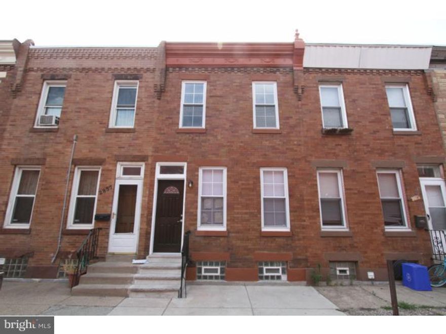 This is an absolutely stunning 2 story brick front 2 bedroom home. A must see in up-and-coming Port Richmond ! Enter into a modern and spacious open floor plan and you will be greeted by pristine hard wood floors and recessed lighting. There is plenty of space for a living and dining room set in this space. The walls throughout have been professionally painted and look like new construction. The large eat in kitchen is spectacular with light tile floors paired perfectly with glass subway tile back splash, handsome cabinetry, granite counters and stainless appliances. There is a huge rear yard with a raised brick green space, expertly landscaped. The full unfinished basement is meticulous, painted, has washer and dryer and there is ample space for storage. The 2nd floor has 2 large bedrooms with ample closet space, filled with natural light and a modern hall bath. The bathroom is completely designed with a contemporary flair with an inlay int he shower for toiletries, and a storage vanity.  We welcome your visit.