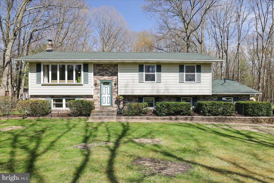 Agents who are not members of Bright, Please set up showings via Showingtime. Solid 4-bedroom, 2-bath home set on a private 1-acre lot with a peaceful wooded backdrop, showcasing true pride of ownership from its original owners. This well-maintained home offers a spacious layout with a large family room, living room, dining area, and an updated kitchen featuring quartz countertops (2020) and stainless steel GE appliances (2019). Major upgrades include a brand new roof (2026) with transferable 50-year warranty, Generac whole house propane generator, and a new Pioneer ductless heat and AC system (2025). Enjoy outdoor living on the fully restored Trex deck with new stairs and railings (2025), along with a refreshed lawn and repaved driveway (2021, sealed 2025). Additional highlights include a wood-burning stove, Andersen sliding glass door (2025), upper deck, shed, and a garage with workshop and storage space that can be converted into a 2-car garage.  Home was built with 2x6 construction and owners installed extra insulation for efficiency and comfort. Ideally located with excellent proximity to Camelback Mountain and Great Wolf Lodge, offering easy access to year-round recreation, dining, and entertainment.  Don't miss this opportunity!