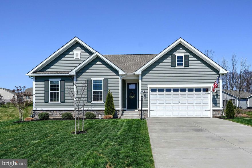 Come see us this Sunday at our Open House from 11:30-1:30! Welcome to 502 Tabasco Cat Court, a spacious Custom Rancher built in 2022, situated on a quiet cul-de-sac in the sought after Gated Community of Bulle Rock. Not only does this home offer Three Bedrooms, and Three Full Bathrooms but it also boasts an Office and an additional Flex Room and is located on one of the larger lots in the community. 

As you walk in you will be greeted with beautiful LVP flooring leading to an Open Concept Living Room/ Dining Room & Gourmet Kitchen. The Kitchen comes complete with Granite Countertops and Center Island. Sliding glass doors open to your Trex Deck, where you can relax and drink your morning coffee with peaceful views of a small wooded area that provides natural privacy. The Primary Bedroom includes a Large Bathroom featuring a Walk-In Shower and Dual Sinks that leads to your Large Walk-In Closet.  Also located on the Main Level is another Bedroom, Full Bathroom, Office space, and Laundry Room.  

The Lower Level comes complete with over 1700 finished square feet including a Third Bedroom with a Walk-In Closet, a Full Bathroom, and a Flex room that could be used for an at Home Gym, 4th Bedroom, or Kids Playroom. Underneath the steps you will find plenty of unfinished space, perfect for extra storage needed! Rest easy knowing all of your Big-Ticket items like HVAC, Roof, Windows, and Water Heater are only three years old.   The community covers lawn care & snow and trash removal. The Residents Club features a full gym, billiards room, indoor and outdoor pools! If you love the outdoors or have a pet, various walking trails are located throughout the community. Do not miss out on this opportunity!