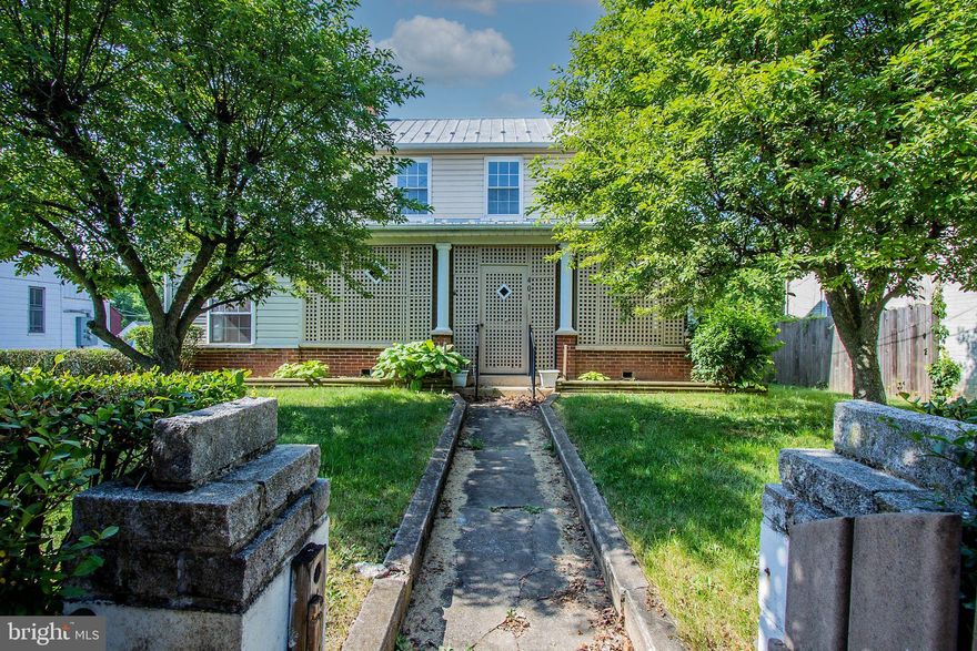 Great turn of the century home located in Historic Downtown Martinsburg, large private lot, two enclosed porches, 3 bedroom 1.5 baths, large kitchen, dining rm, living Rm and Den, modern Gas furnace. Detcahed garage, listed as a two car but the doors have been covered over so no car access, used as a workshop and additional space great opportunites exist with this seperate building.