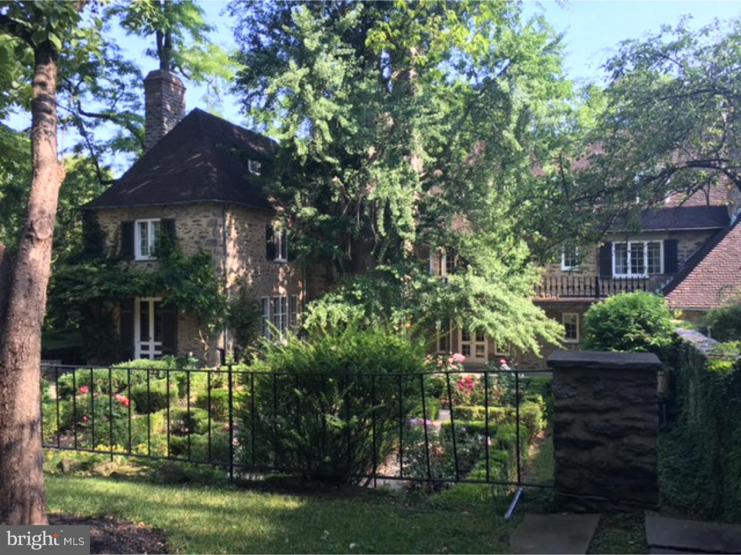 Even within the fabled French Village, known for its special architecture, this property merits special distinction. Inspired by structures of rural Normandy, developer George S. Woodward commissioned Willing, Sims and Talbutt to create this magnificent country house with its prominent round tower, high conical roof, and decorative half timbering, within a setting distinguished by its walled formal gardens. The light filled entry foyer sets an elegant tone that is carried throughout the house. Among many highlights, a paneled great room with fireplace and marble mantel, large dining room with french doors opening to outdoor terraces, bright cooks kitchen with Sub- Zero refrigerator,Bosch cook top and double wall ovens, richly paneled den with fireplace,and classic original pantry with glass faced doors, bar sink, and dishwasher. The second floor master suite will delight with its original built-ins, dressing room, and four piece bath with emerald green mercer tile. Five additional bedrooms and three baths allow for great flexibility for both family and guests.Architectural details continue throughout, with interesting built-ins appearing at every turn. The third floor is configured as an au pair suite with back stair access,two bedrooms, living room, and small kitchenette.