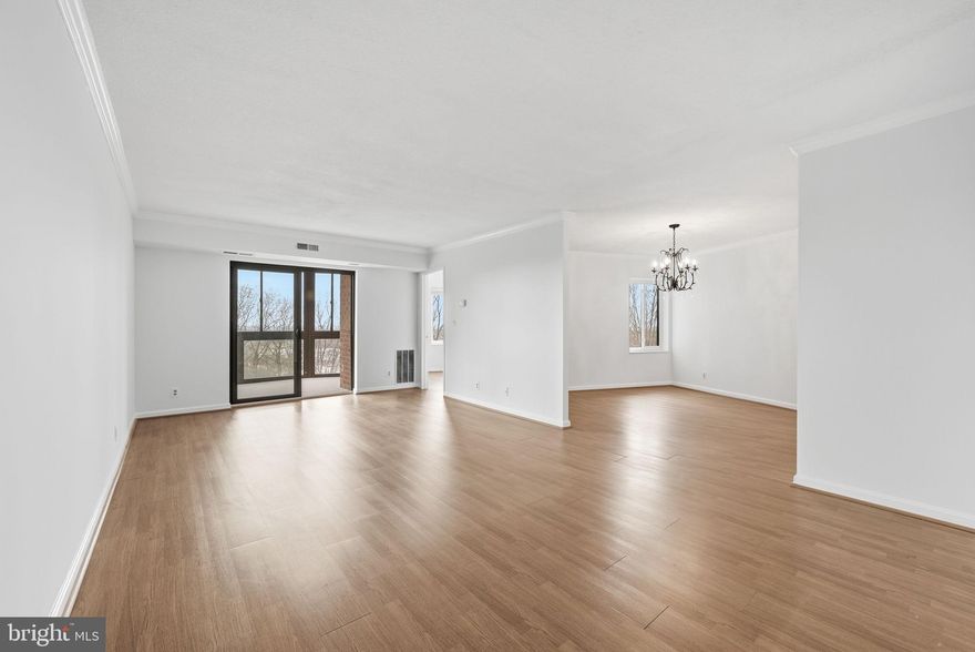 Open House: Sunday May 24th 1-3pm
Price Improvement! 
This beautiful 3 bedroom, 2 bathroom condo offers 1,500 square feet of refined living space in one of McLean’s most sought-after and convenient communities.
This large, bright unit provides a wonderful backdrop for both everyday living and entertaining. It features a spacious living room, formal dining room, well-appointed kitchen, and a light-filled sunroom.  
The unit features luxury vinyl plank flooring throughout the living room, dining room, kitchen, and third bedroom. Fresh paint, updated lighting fixtures, and brand-new carpet in two bedrooms and the sunroom give the home a crisp, refreshed feel. Expansive windows and two sliding glass doors flood the space with natural light and open to the enclosed balcony — the perfect spot to relax and enjoy lovely views.
The bright, polished kitchen offers abundant cabinet storage and generous counter space, along with room for casual dining. For added convenience, a stacked washer and dryer are discreetly tucked away within the kitchen area.  
The quaint primary suite features a walk-in closet, en-suite full bath, oversized windows with plantation shutters, and abundant natural light. The second bedroom boasts floor-to-ceiling windows as sliding doors lead directly from the bedroom to the sunroom.  
The Rotonda Condo Community sits on 34 acres of private, beautifully landscaped grounds and resort-like amenities. Its community center features a library, kids play area, a fitness/workout center, yoga studio, indoor pool, outdoor pool, locker rooms with sauna and showers, a game room with billiards, foosball table and plenty of seating, and more. Outdoor amenities include basketball courts, volleyball courts, a dog park, and walking trails. 
Easy access to major commuter routes including Route 7, 495, the Dulles Toll Road and the Silver Line Metro is close by as well. Quick access to all of the amenities Tyson’s Corner has to offer.  Parking Spot 91 on level B1.