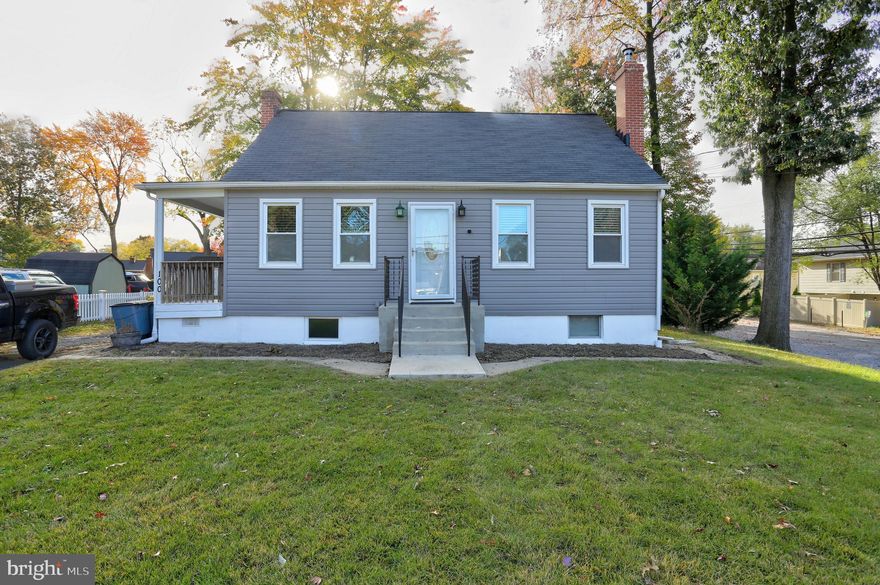 Welcome to this stunning, completely updated and renovated 4 Bedroom, 2 Bath Cape Cod, perfectly blending classic charm with modern living. Step inside to an inviting open concept floor plan featuring beautiful new LVP flooring that flows seamlessly throughout the main level. The heart of the home is the brand new kitchen, a chef's delight boasting sleek finishes and a large peninsula counter with convenient  seating—perfect for casual dining and entertaining. The spacious living/dining room combo is anchored by a cozy wood stove, creating a warm and inviting ambiance for gatherings. Both bathrooms have been newly renovated with contemporary fixtures and finishes. The space and possibilities continue in the finished lower level, which features a large family room area, ideal for movie nights or recreation. It also includes a dedicated large office space, making working from home a breeze, and a functional kitchen/bar area for effortless entertaining. A full second bath completes the basement level. Upstairs, you'll find a large open area that offers flexible use—maybe reading nook, play space, or secondary office—along with the fourth bedroom. Set on a large lot, the exterior is just as appealing, offering plenty of outdoor space and a charming covered side porch for relaxing. A convenient walk-out basement provides easy access to the backyard. This move-in ready home is a must-see!