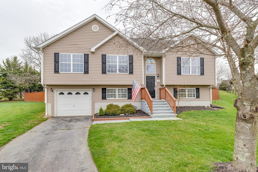 FOR RENT! Welcome to 182 Jack Rabbit Lane located in Briar Run in Ranson, WV! Ideal commuter location, near Potomac Market Place, Route 9, Route 340, Charles Town, Harpers Ferry, Marc Train and easy commute to VA and MD. Nestled in a cul de sac this home gives you the backyard space you want! Fully fenced with a large deck that overlooks the neighboring pasture, perfect for quiet evenings or entertaining. This split foyer offers plenty of space, featuring 4 bedrooms and 3 full baths. Open concept Kitchen/dining/ living with cathedral ceilings. Primary bedroom with two closets and spacious ensuite bathroom with dial vanity, separate soaking tub and shower. 2  additional bedrooms on the main level. Downstairs you will find additional finished living space, laundry room, 3rd full bath and the 4th room that could be used as a bedroom or workspace.  Washer and dryer in unit. Applicant(s) must be able to pass credit/background check. MINIMUM 650 CREDIT SCORE. No Smoking. Pets are Case by Case with additional deposit equal to first month rent. Security deposit and first month rent due at lease signing. Call to schedule your private tour!
