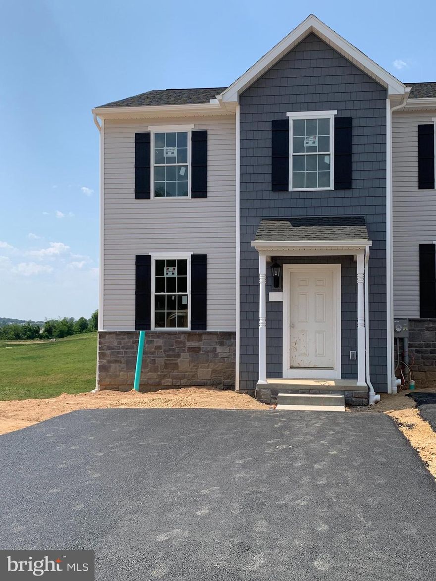 You will love the country side location of Homestead Acres & it is just minutes from the Maryland line for easy commuting to Baltimore & Washington Dc!  This Aberdeen model features 3 bedrooms, 2 1 /2 bathrooms, 2' Foyer & a 2' bump in the 2nd bedroom with shake siding and stone to window, board batt shutters, front porch with 5 x 5 turned post, 9' ceilings on first floor, upgraded laminate flooring in main areas, granite kitchen countertops, 36" rich expresso kitchen cabinets w/crown trim, kitchen island, pantry, 2nd floor laundry, hall bathroom with tub/shower, owners walk in closet, owners bathroom with shower, basement walk out door, 3 pc. rough in basement for future bathroom and much more!  ( Exterior & Interior photos are of similar photos of prior models)