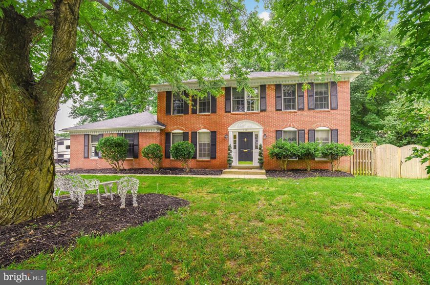 Location Location Location! Brick front colonial in sought after Quailwood...situated on a corner lot with a private backyard. Kitchen w/granite counters, overlooks family room w/FP. Lux master suite w/updated master bath. 5th BR on main level. Updates include: heat pump & roof. Backyard patio & 1 car garage.