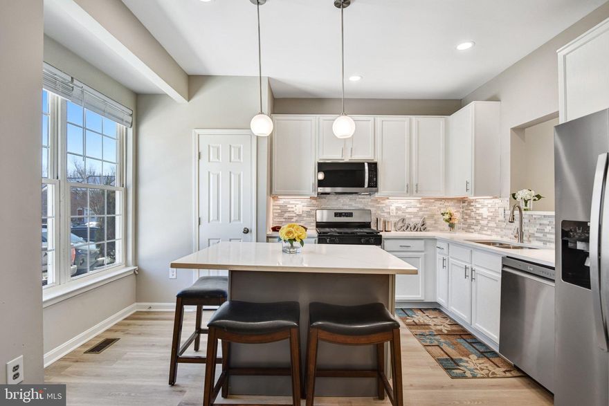 ***Open Sunday (3/15) 2pm-4pm.*** Lovely 3-level townhome with 3 bedrooms and 3.5 baths, plus 1 den in the basement. Main level features generous living and dining areas with sleek LVP floors, upgraded kitchen with Quartz Island & stainless-steel appliances, powder room, and access to the fenced backyard. Upper level primary suite with an en-suite spa bath & walk-in closet, 2 additional bedrooms sharing a full bath, plus convenient full-sized laundry. Fully finished basement with a huge family room, a Den, and a full bath offers incredible flexibility.  Ideally located in the heart of Manassas, close to RT234 & I-66, VRE, minutes to shopping and dining, public library, and more!