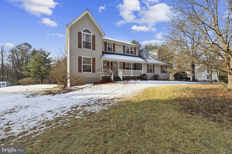 Welcome to this exceptional custom-built Colonial at 7742 Lake Shore Drive, nestled on a premium private acre lot in the desirable community of Victoria Station, where luxury, privacy, and refined living come together seamlessly. Thoughtfully positioned to maximize outdoor space while maintaining natural privacy, this beautifully updated residence offers an elegant lifestyle across three spacious levels designed for both everyday comfort and upscale entertaining. Upon entering, you are welcomed by a light-filled open floor plan enhanced by expansive windows that bathe the home in natural light. The main level showcases sophisticated yet comfortable living spaces, including a formal dining room, elegant sitting room, and a private office—perfect for today’s work-from-home lifestyle. At the heart of the home, the gourmet kitchen is designed for both everyday living and entertaining, featuring modern stainless-steel appliances installed in 2022, granite counters, premium cabinetry, and generous prep space overlooking the inviting sunken family room, creating a seamless gathering space for family and guests alike. Upstairs, the home offers four generously sized bedrooms with impressive closet space. The lavish owner’s suite provides a true private retreat, highlighted by a spa-inspired bathroom featuring a custom tile walk-in shower, large walk in closet and thoughtfully designed space that blends luxury with everyday comfort. The fully finished lower level expands the home’s versatility and luxury lifestyle. Designed with flexibility in mind, it includes a private suite with its own entrance, ideal for multi-generational living, extended family, or guests seeking additional privacy. The additional space offers a flexible layout that can easily serve as a recreation area, flex space, or even a private in-home gym. The lower level also features a dedicated home theater room that conveys, creating the perfect environment for movie nights, entertaining, or relaxing with family and friends. Luxury living continues outdoors. A large deck overlooks the beautifully landscaped acre lot, providing a peaceful setting for entertaining, outdoor dining, or simply enjoying the tranquil surroundings. The backyard also features a paver patio area ideal for gatherings and outdoor activities, while the spacious lot offers ample room for a future pool, allowing the next owner to create their own private backyard retreat. Mature landscaping and the thoughtful positioning of the home create a peaceful outdoor retreat, offering the ideal balance of privacy while still enjoying a neighborhood setting. Additional highlights include an oversized attached two-car garage offering extra space for storage, equipment, or workshop potential, along with modern updates that enhance both comfort and efficiency. Recent improvements include a new HVAC system (2022) and upgraded stainless-steel kitchen appliances (2022). Located within the established Victoria Station community, this home offers access to wonderful neighborhood amenities including tennis courts, basketball courts, a scenic lake, and a playground, along with nearby parks, trails, and recreational spaces. Perfectly situated in Northern Calvert County, this home offers a commuter-friendly location with convenient access to Washington, DC/Virginia, Annapolis, and Baltimore. The property is ideally located between the Southern Maryland Technology Corridor and Washington DC/Virginia, providing proximity to major employment centers including Joint Base Andrews, PAX Naval Air Station, and surrounding government and private-sector hubs. Nearby shopping, dining, and everyday conveniences are just minutes away, while the Chesapeake Bay and Calvert County’s beautiful twin beaches offer endless waterfront recreation. Combining luxury, privacy, modern updates, and an exceptional location, this custom-built residence offers a truly elevated lifestyle in one of So Maryland’s most desirable communities.