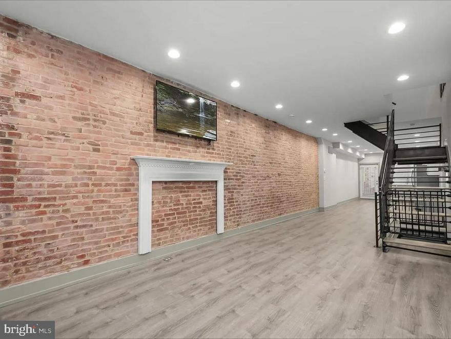 Accepting Section 8 Vouchers - Welcome to this beautifully renovated 3-bedroom, 3-bathroom rowhome just minutes from the heart of Canton. This stunning home blends historic charm with modern updates, featuring exposed brick walls, iron staircases, recessed lighting, and a gourmet eat-in kitchen with stainless steel appliances and gas cooking. The finished basement provides a flexible space perfect for a guest suite, home office, or entertainment area. The spacious primary suite offers a tray ceiling, walk-in closet, and an ensuite bath. Enjoy the private backyard, ideal for relaxing, grilling or gardening. Conveniently located near Patterson Park, shopping, dining, and major highways, this home is perfect for city living. Schedule your private tour today and experience the perfect blend of style and comfort.