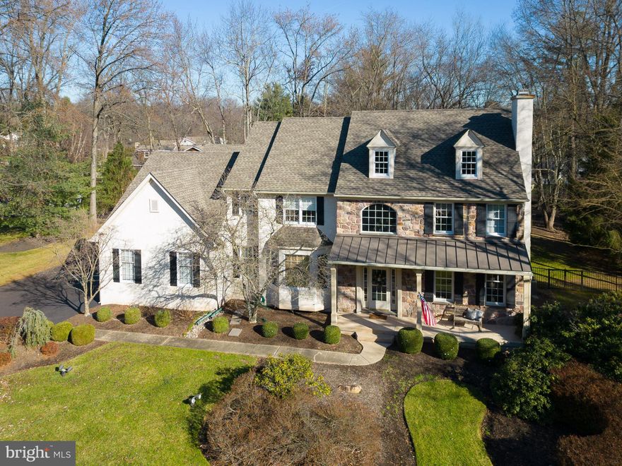 Welcome to the heart of Lower Gwynedd, where this expansive 5-bedroom, 4 full, 2 half bathroom Westrum-built Colonial Farmhouse, offers over 7000 square feet of living space and extends a warm welcome with its inviting features. It's a perfect haven for multi-generational living. Nestled on a generous 3/4-acre lot in the Wooded Pond community, this residence seamlessly blends modern comfort with timeless charm, highlighted by the appeal of its welcoming front porch.  Adding to the allure, the exterior of this home exudes curb appeal, showcasing a stone and stucco facade complemented by the expansive front porch—a perfect spot to unwind and enjoy the relaxed atmosphere. Practicality meets aesthetics as a 4-car garage maintains the inviting exterior without compromising convenience.  Step inside and the kitchen emerges as a central hub for culinary exploration and casual gatherings. Seamlessly connected to the dining area, this space encourages the creation of lasting memories. Renovated bathrooms throughout the home introduce a contemporary touch, elevating the overall appeal. The bedrooms, including a luxurious primary suite, provide comfortable retreats for rest and rejuvenation. Recognizing the importance of remote work, a much-needed home office is thoughtfully incorporated, offering a dedicated area to enhance productivity. The main floor office, featuring glass-paneled doors for privacy, adds to the practical work-from-home options. For those seeking multi-generational living, it's the in-law suite that takes center stage, contributing to the over 7000 square feet of living space. Complete with its own kitchen and bath, this space adds a layer of flexibility to this home. Whether hosting guests or transforming it into a pool house for the heated in-ground pool, the in-law suite adapts to your evolving lifestyle.  The finished basement contributes versatility, providing room for hobbies, workouts, or an additional home office. Wooded Pond's access to walking trails offers a scenic escape right at your doorstep. Quick drives to the Ambler YMCA, Springhouse shopping center, and the charming town of Ambler, coupled with proximity to multiple private schools, enhance daily convenience.
830 Wooded Pond is more than a house: it's a welcoming home in a sought-after community. Top-ranked Wissahickon School District ensures an excellent education, and proximity to private schools provides additional educational options. Discover a place where comfort meets charm in Lower Gwynedd—a haven that truly feels like home. Schedule your showing TODAY!