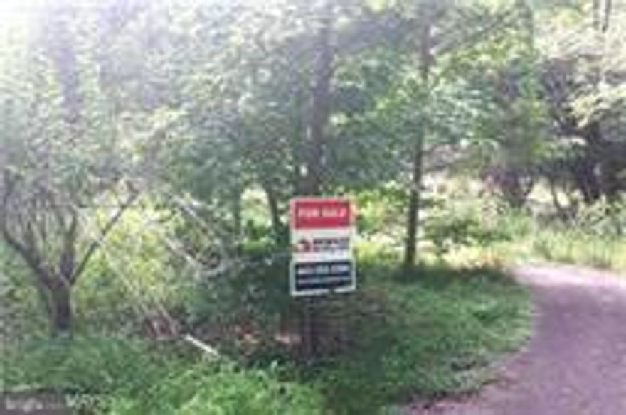 Lot 17 - .64 Acre of woodland paradise waiting for you and the home of your dreams.  Public water & sewer hookup available.  Private road - 1/4 mi. off Rt. 7.  Houses on neighboring street are selling in the upper $300s.Lot 18 - .46 Acre is also available.  See MDHR235192.