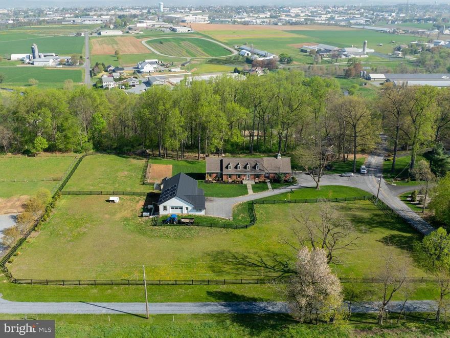 PROPERTY IS BEING OFFERED FOR SALE AT PUBLIC AUCTION. THE LISTING PRICE IS THE OPENING BID ONLY AND DOES NOT INDICATE THE FINAL SALE PRICE. ACCEPTED BID PRICE WILL BE BY SELLER CONFIRMATION ON THE DAY OF SALE, PROPERTY IS BEING SOLD AS IS, NO CONTINGENCIES. AUCTION DATE: June 10,2025 @ 6pm.  Property Description: 3.6 acre Homestead in excellent condition. Beautiful 4 bedroom brick house w/ 2 car garage, finished basement, radiant floor heat, set up for central air and heat pump, newer kitchen, basement family room, cold storage room, 32'x56 bank barn (4 horse stalls), 15'x24' garage, 32'x56' heated rec room w/ full kitchen, nice backyard with patio. solar system w/ 48 volt inverter, 400 amp batteries, 6k diesel gen set, large pasture, property backs up to woodland. Only a few minutes drive from New Holland or Intercourse PA. This property is in move-in and excellent condition. Sellers are relocating and motivated to sell. Open House Dates: May 17, 2025 (1-3pm) & May 20, 2025 (5-8pm). Settlement on or before August 1, 2025.