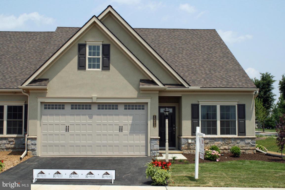 Custom Winchester Model. Features Include 1st Fl. Owners Suite w/Gas FP,  Private Bath w/Tile Shower & WIC, Lg.Great Rm w/Vaulted Ceiling & Gas FP, Formal Dining Rm. w/Columns, Spacious Kitchen w/Granite Tops, Screened Porch, Lg. Loft
