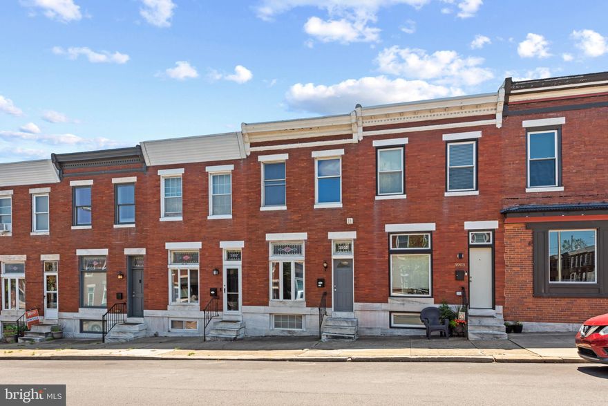 Step into this beautiful home located in the desirable Brewer's Hill neighborhood, offering a perfect blend of modern amenities and classic charm. The open floor plan on the main level is highlighted by exposed brick and gleaming hardwood floors, creating an inviting and spacious environment perfect for entertaining and family living.

The kitchen is a chef's dream, featuring upgraded countertops, a stylish subway tile backsplash, ample cabinet space, and sleek stainless steel appliances. A convenient half bath on the main level adds to the home's functionality.

Upstairs, you'll find two generously sized bedrooms and two full baths. The primary bedroom is a true retreat, complete with an en suite bath and walk-in closets, offering both luxury and convenience.

The finished basement provides additional living space and a room perfect for storage or a home office. This home truly has it all, combining comfort, style, and a prime location. Don't miss the opportunity to make this stunning house your new home!