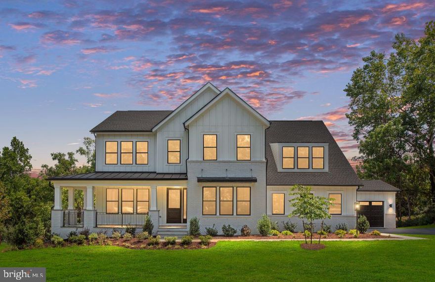 Move-In Ready! Celebrate the Holidays in a Brand-New Home. Welcome to The Kalorama Fairview — a stunning, move-in ready home nestled on a peaceful 3-acre estate in Leesburg. Perfectly blending modern luxury with everyday functionality, this beautifully designed  residence is ready to welcome you home for the holidays. From the moment you arrive, the wraparound front porch and wooded surroundings set the tone for tranquility and comfort. Inside, a soaring two-story great room with 12-foot stacking glass doors invites in natural light and opens to a spacious deck—complete with a sleek outdoor fireplace and retractable screens for year-round enjoyment. At the heart of the home is a modeled staircase connecting all three levels with style and continuity. The open-concept layout flows effortlessly, with refined spaces designed for both entertaining and daily living. The chef’s kitchen is a dream for culinary enthusiasts, boasting high-end appliances, a large island, walk-in pantry, and a separate butler’s pantry. Hosting is a breeze with the bonus of a second full kitchen—perfect for catering, entertaining, or multigenerational needs. The main-level guest suite offers private living quarters with a bedroom, sitting area, and spa-inspired bath—ideal for extended family or aging in place. Upstairs, the luxurious primary suite features calm views, oversized closets, and a spa-like bath. Secondary bedrooms each enjoy their own private en-suite bath and walk-in closet, centered around a cozy loft space. The finished walk-out lower level expands your living space with a bright rec room, additional bedroom and bath, and access to a patio—ideal for indoor-outdoor entertaining. Designer-curated finishes and thoughtful details throughout make this home both sophisticated and livable. Located just minutes from historic downtown Leesburg, you'll enjoy easy access to shopping, dining, local wineries, breweries, and community events. Schedule your private tour today and be home for the holidays!