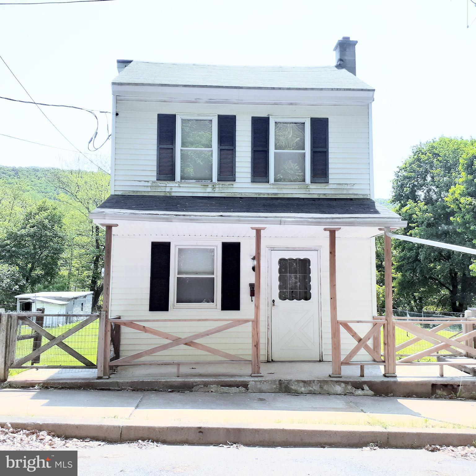 Back on the market due to no fault of the home.  Buyers home never made it to settlement so he could not go forth with this sale.  Detached home with handicap accessible amenities.  First floor consists of a Living room, large kitchen and full bath.  Laundry is on the first floor.  Upstairs there are 3 separate bedrooms ( no walk- through ) and another recently remodeled full bathroom.  Very large back yard and a side yard as well.  There is a small concrete patio in the back and also a back porch.  Alley access to rear parking as well as on street parking in the front of the home.  Borough inspection has been completed as well as the required corrections.
