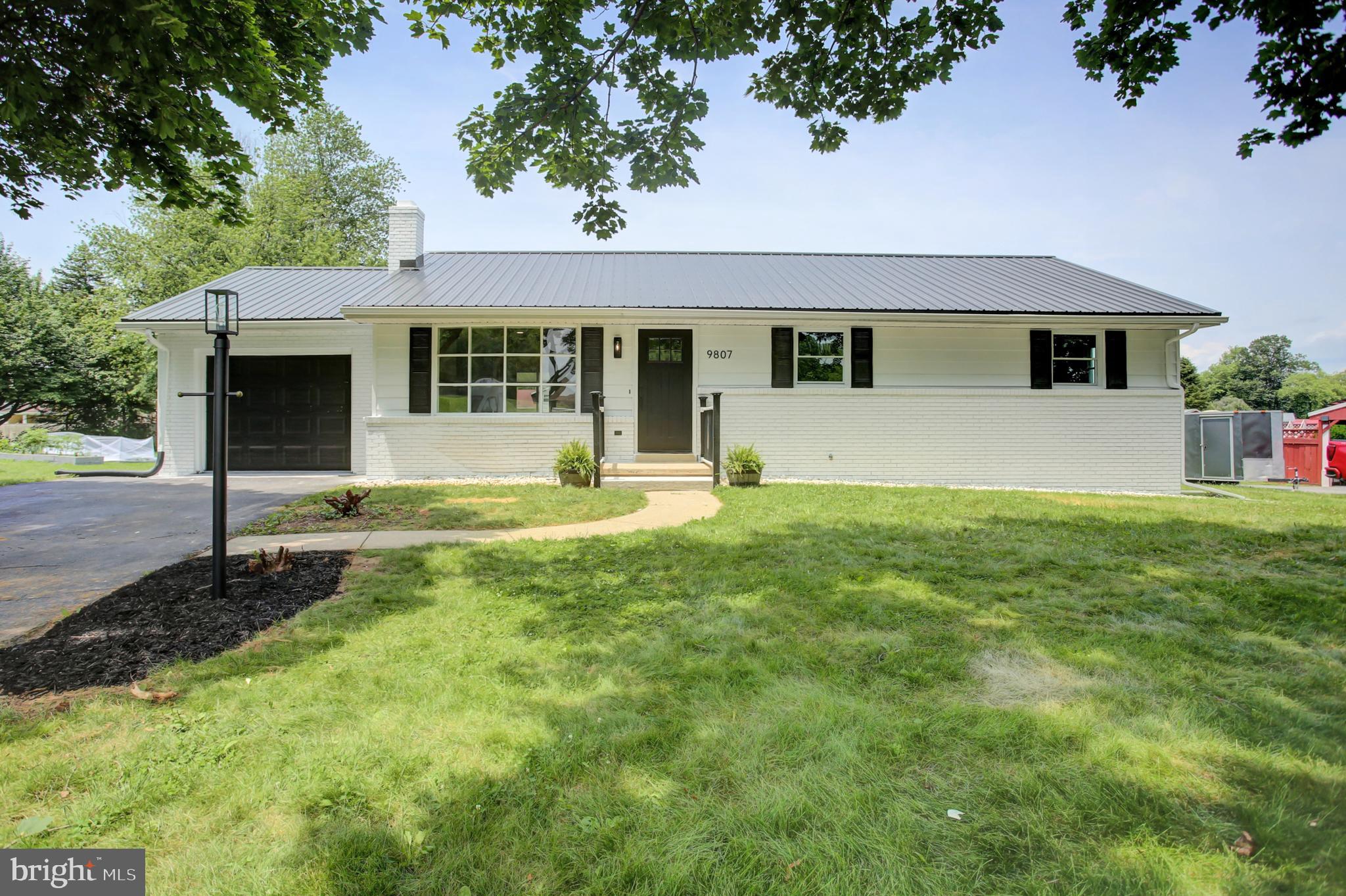 Fully Renovated Ranch with Finished Basement & Bonus Rooms – Turnkey Living Minutes from Town!
Welcome to 9807 Possum Hollow Road – a beautifully updated 3-bed, 2.5-bath rancher offering over 2,400 sq ft of finished living space, including a versatile finished basement with potential for two additional bedrooms, a home gym, or media room.
Top-to-Bottom Renovation (2025)
Originally built in 1974, this home has been completely transformed with modern finishes and smart upgrades throughout. Enjoy long-term peace of mind with a brand-new metal roof, new HVAC system with 10-year warranty, new water heater, all new windows, updated electric, plumbing, and flooring.
Stylish Kitchen & Comfortable Living
The updated kitchen features new stainless steel appliances (refrigerator, oven/range, microwave, dishwasher) and opens into a sunlit dining area and covered rear deck—perfect for entertaining. A modern electric fireplace adds cozy charm to the main living space.
Fully Finished Basement
Includes a brand-new interior French drain system with a lifetime waterproofing guarantee, providing dry, usable space for additional bedrooms, office, rec room, or storage.
Other Highlights: