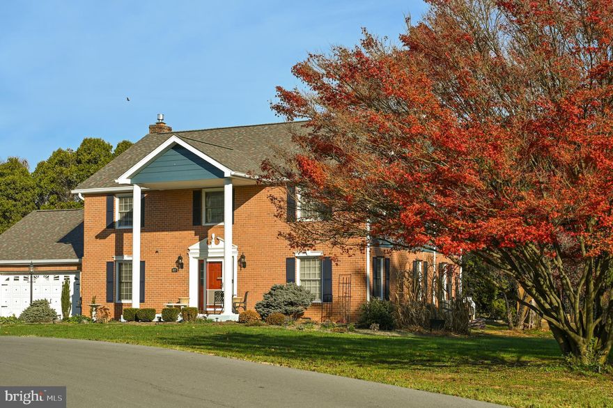Beautiful brick front Colonial featuring over 2800 finished square feet, 4 bedrooms, hardwood floors in the foyer & kitchen,  formal dining room, a living room, and a family room with propane gas fireplace controllable by a remote. The large kitchen with breakfast area boasts a bay window, a Breakfast Bar, new custom Butcher block countertops, new appliances including a dishwasher, an induction stove (some pots and pans for the stove will be left), a new convection oven, a 4-door refrigerator, & front load washer & dryer. All bathrooms have one-piece toilets, including the primary, 2nd, and a half bath. The large 2nd full bath upstairs has luxury vinyl tile. The home has two heat pumps, both of which were recently replaced. The rear deck has been removed and replaced with a concrete patio, complete with a gazebo or pergola. The roof has architectural shingles. A new water heater was installed and relocated to the garage. The old water heater is in the garage, not connected, and could be brought back inside if desired. The oversized garage measures 24 x 28 feet with built-in shelves and cabinets, and the wood stove will remain. The extended driveway provides additional parking and includes an added outlet for RVs. The shed is approximately 4 years old, 16 x 10 feet, constructed with hardy board siding, a wood frame, a 3/4” plywood floor, and a metal barn-style roof. Inside is a workbench and storage above, with two doors—one in the front and one at the end. The property features a large fenced-in organic garden (20' x 30')  that could be converted into a dog run if the buyers are not interested in gardening. A small shed by the garden will remain. There is also a water spigot on the east side of the home for added convenience. The cut firewood will stay with the new homeowner. There is a full walk-up attic with partially finished rooms in place and LED lighting, offering endless possibilities and excitement for the new homeowner.
This home shows pride of ownership throughout.  Located just minutes from schools, shopping and major commuting routes. Don’t miss your opportunity to make this home yours!