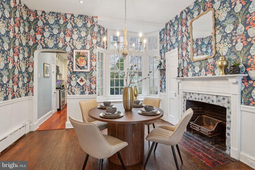 Just Reduced! 323 South Camac Street, a rare offering on one of Washington Square West’s most admired and storybook streets. Surrounded by tree-lined blocks, neighborhood cafés, parks, and endless conveniences, this address places you at the center of one of Philadelphia’s most walkable and spirited communities. Inside, the home blends historic integrity with modern upgrades. The welcoming front living room showcases tall ceilings, abundant character, and the first of four fireplaces, all accentuated by the home’s newly refinished 225-year-old yellow pine floors—a remarkable original feature. The adjoining dining room offers another fireplace and a wide window that radiates natural light from the private courtyard. Beyond, the thoughtfully designed galley kitchen includes quartz countertops, stainless steel appliances, and charming built-in seating. Step through the French doors to a quiet brick courtyard, ideal for casual meals, unwinding outdoors, or hosting friends. The second floor offers two comfortable bedrooms, each with their own fireplace, and a full bath. The recently renovated third floor serves as a private retreat, complete with vaulted ceilings, generous closet space, an updated en-suite bath, and a balcony accessed through new French doors—a serene vantage point to enjoy city lights and treetop views. A bonus room on this level works beautifully as an office, studio, or fourth bedroom. The finished lower level adds additional living potential—perfect for hobbies, home fitness, play area, or additional storage if need.  The lower level also includes a powder room,  washer and dryer. Conveniently,  there is outside access to the street level.  Major improvements further enhance the home’s comfort and reliability: a new flat roof, upgraded electrical, and a new HVAC branch installed in 2025. The property also retains its original historic windows, adding to its authenticity. A shared alley between homes offers convenient outdoor storage, and an Amazon package lockbox provides for secure delivery. To top it off, the sellers will provide one year of prepaid parking permit at closing or there are many parking lots in the area for the buyer's choosing. Just steps from beloved neighborhood destinations such as Vetri Cucina, Habitat Coffee House,  Good Karma Cafe, Seger Park and Dog Park, Kahn Park, Whole Foods, and Acme.  There are multiple transit options for your convenience and just a 10 minute walk to Washington Square! This home offers an unmatched blend of location, character, and thoughtful updates. A truly distinctive residence on a cherished block—323 South Camac invites you to experience historic Philadelphia living at its finest.