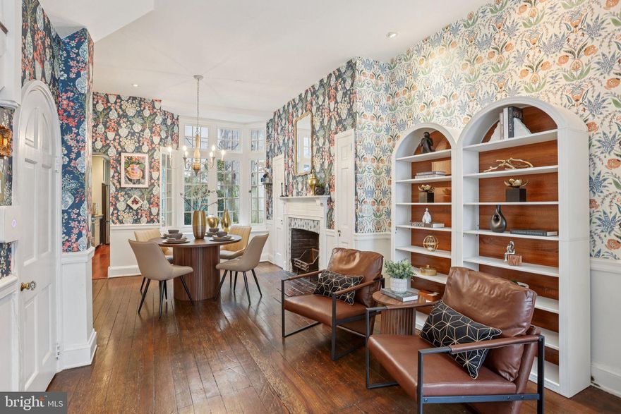 Price improvement! 323 South Camac Street, a rare offering on one of Washington Square West’s most admired and storybook streets. Surrounded by tree-lined blocks, neighborhood cafés, parks, and endless conveniences, this address places you at the center of one of Philadelphia’s most walkable and spirited communities. Inside, the home blends historic integrity with modern upgrades. The welcoming front living room showcases tall ceilings, abundant character, and the first of four fireplaces, all accentuated by the home’s newly refinished 225-year-old yellow pine floors—a remarkable original feature. The adjoining dining room offers another fireplace and a wide window that radiates natural light from the private courtyard. Beyond, the thoughtfully designed galley kitchen includes quartz countertops, stainless steel appliances, and charming built-in seating. Step through the French doors to a quiet brick courtyard, ideal for casual meals, unwinding outdoors, or hosting friends. The second floor offers two comfortable bedrooms, each with their own fireplace, and a full bath. The recently renovated third floor serves as a private retreat, complete with vaulted ceilings, generous closet space, an updated en-suite bath, and a balcony accessed through new French doors—a serene vantage point to enjoy city lights and treetop views. A bonus room on this level works beautifully as an office, studio, or fourth bedroom. The finished lower level adds additional living potential—perfect for hobbies, home fitness, play area, or additional storage if need.  The lower level also includes a powder room,  washer and dryer. Conveniently,  there is outside access to the street level.  Major improvements further enhance the home’s comfort and reliability: a new flat roof, upgraded electrical, and a new HVAC branch installed in 2025. The property also retains its original historic windows, adding to its authenticity. A shared alley between homes offers convenient outdoor storage, and an Amazon package lockbox provides for secure delivery. To top it off, the sellers will provide one year of prepaid parking permit at closing or there are many parking lots in the area for the buyer's choosing. Just steps from beloved neighborhood destinations such as Vetri Cucina, Habitat Coffee House,  Good Karma Cafe, Seger Park and Dog Park, Kahn Park, Whole Foods, and Acme.  There are multiple transit options for your convenience and just a 10 minute walk to Washington Square! This home offers an unmatched blend of location, character, and thoughtful updates. A truly distinctive residence on a cherished block—323 South Camac invites you to experience historic Philadelphia living at its finest.