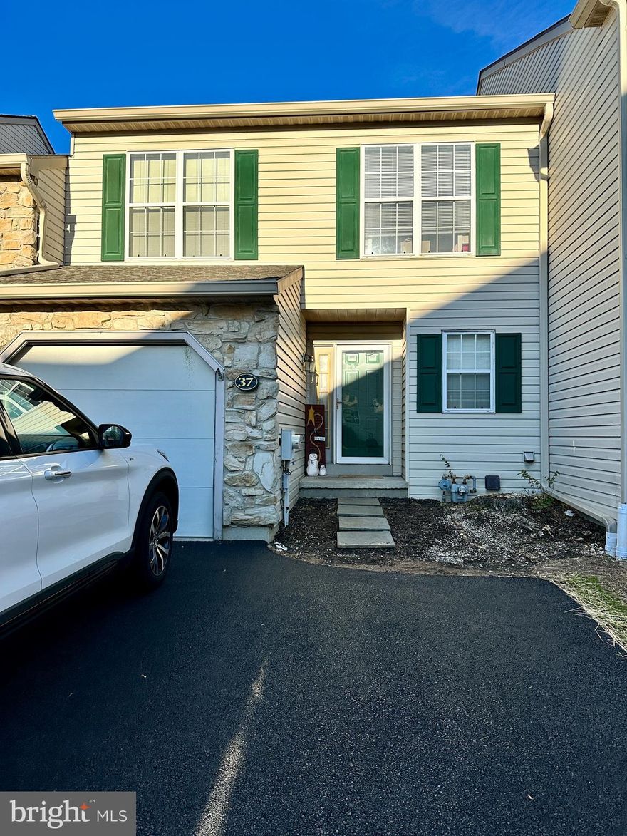 Beautiful, meticulously kept and renovated with hard wood floors throughout, specious town home in the most desired location of Norristown - Berwick Place. Close to parks, restaurants and shopping mall. As you walk in into gracious living room you will feel the cosiness of home immediately. Open floor plan offers great flow for entertaining with perks such as a fireplace, recessed lighting and a slider to the oversized deck with a magnificent view of the wood backing up the community. Kitchen has a dishwasher, range stove, built in microwave and cherry cabinets. The first floor also provides a washer and a dryer. The second level features a great size master suite with cathedral ceiling, a ceiling fan, oversized walk in closet and a sumptuous master bath with jacuzzi tub, a palladian window and a shower corner. There are also 2 other bedrooms with closets and another full bath. Finished basement can be used as an office or recreation area. Lots of living space in this home provides for entertainment with privacy and convenience. There is one car garage and 2 car parking spot in the driveway. Available for immediate occupancy. Won't last long, make it yours today!