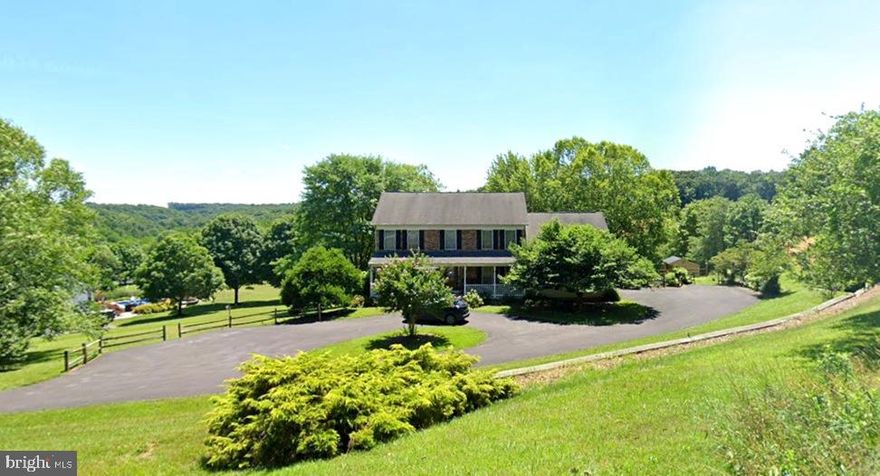 ***Original Owners*** Pride of ownership is evident in this pristine home! The property features spacious front, side, and backyards, perfect for kids and pets to run around. Enjoy the beauty of mature trees and well-maintained landscapes, with picturesque views of grassy land, creating a serene country-living experience. This home is move-in ready and perfect for anyone seeking a beautiful, well-maintained property with well-thought-out features! An expanded front porch and a vinyl/Trex rear deck span the full length of the house, with an elaborate staircase that leads to the backyard and side parking pad. The floor plan includes a front foyer, a double coat closet, and separate living and dining rooms. The breakfast area features sliders that open to the rear deck, while the cozy family room boasts a Picture window and a gas painted brick fireplace (propane). Upstairs, there are four bedrooms, including an extended room over the garage that serves as the primary sitting room or office. The primary suite includes an ensuite bathroom and two spacious walk-in closets. The finished above-grade lower level is ideal for an extended family member or an au pair situation. This extra finished sunny space features a full bath, sliding doors to the backyard, a recreation room (L shaped) with new carpet, a bonus room, and a laundry room. Here are a few highlights of the beautifully appointed kitchen, featuring refinished hardwood floors, easy-clean white cabinets with soft-close drawers and doors, upgraded granite countertops and island, a stainless steel double-bowl sink, and new Whirlpool appliances, including a dishwasher, electric range, microwave, and side-by-side refrigerator. Additionally, the glass subway-tile backsplash and the extra-large pantry enhance functionality. Additional features include a first-floor half bath, a mudroom with built-in storage and a desk, and a double closet with a door leading to the deck.    Recently landscaped gardens and lawns surround the house and oversized shed.  The attached two-car garage includes a "workshop" area. One can "feel good" knowing the owners have taken care of this lovely home!




**Recent Updates:**
- Kitchen remodel: 2016
- Dishwasher: 2026
- Range: 2026
- Refrigerator: 2025
-New Carpet in LR, Famrm, and Recrm
-Fresh Paint in the Bedrooms, Hall Bath and Recrm
- Roof: 2025
- HVAC (Trane): 2017
- Water heater (Rheem power vent): 2025
- Driveway: 2024
- Ceiling fans in two bedrooms
- Shed roof: 2021
- Repainted: 2025
-Front porch power washed
- Well holding tank: 2022